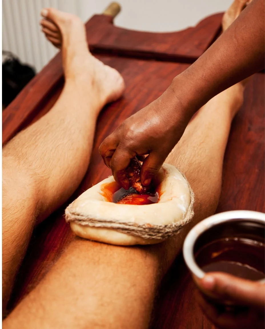 Ayurvedic practitioner consulting a patient about Nasya Therapy in JVC