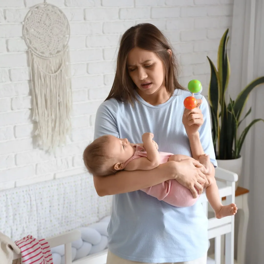 Postpartum mother receiving Ayurvedic Abhyanga in home setting Vedara Care JVC Dubai